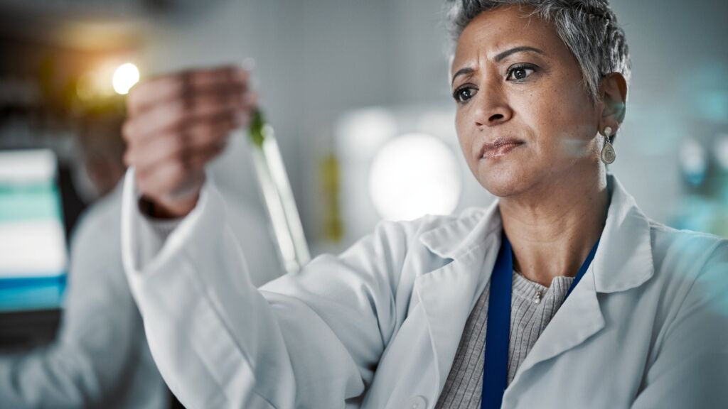 Cross Biologics laboratory scientist analyzing biologic sample for quality and consistency